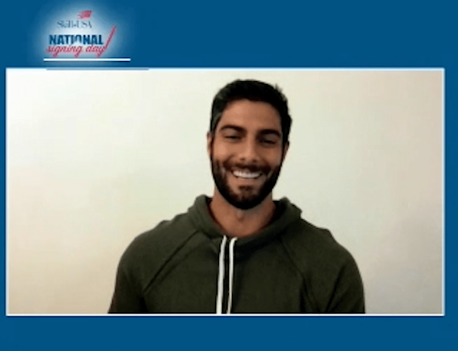 Jimmy Garoppolo Sitting in a chair and and abswering questions